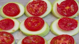 Кабачки с помидорами и сыром в духовке