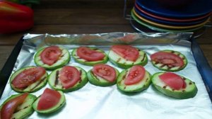 Кабачки в духовке с помидорами и сыром