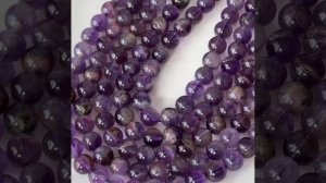 Аметист с включениями гётита полупрозрачный, с трещиноватостью, раковинками, шары 8 мм