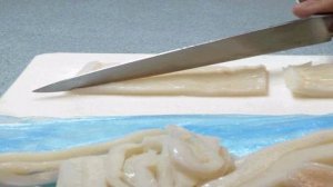 Кальмар с салатом Вакамэ