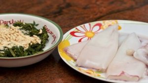 Кальмары, фаршированные шпинатом