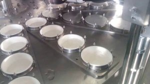 Автомат для фасовки, розлива  в пэт стакан жидких и пастообразных продуктов с запайкой