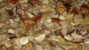 Кальмары, фаршированные рисом и грибами