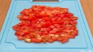 Камбала, запеченная с помидорами