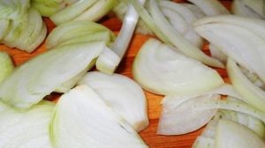 Кальмары, тушенные с овощами