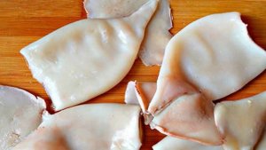 Кальмары с капустой тушеные