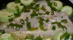 Камбала тушеная