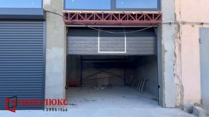 Секционные ворота с калиткой и ролеты установленные в гаражном кооперативе. ОКНАЛЮКС Севастополь