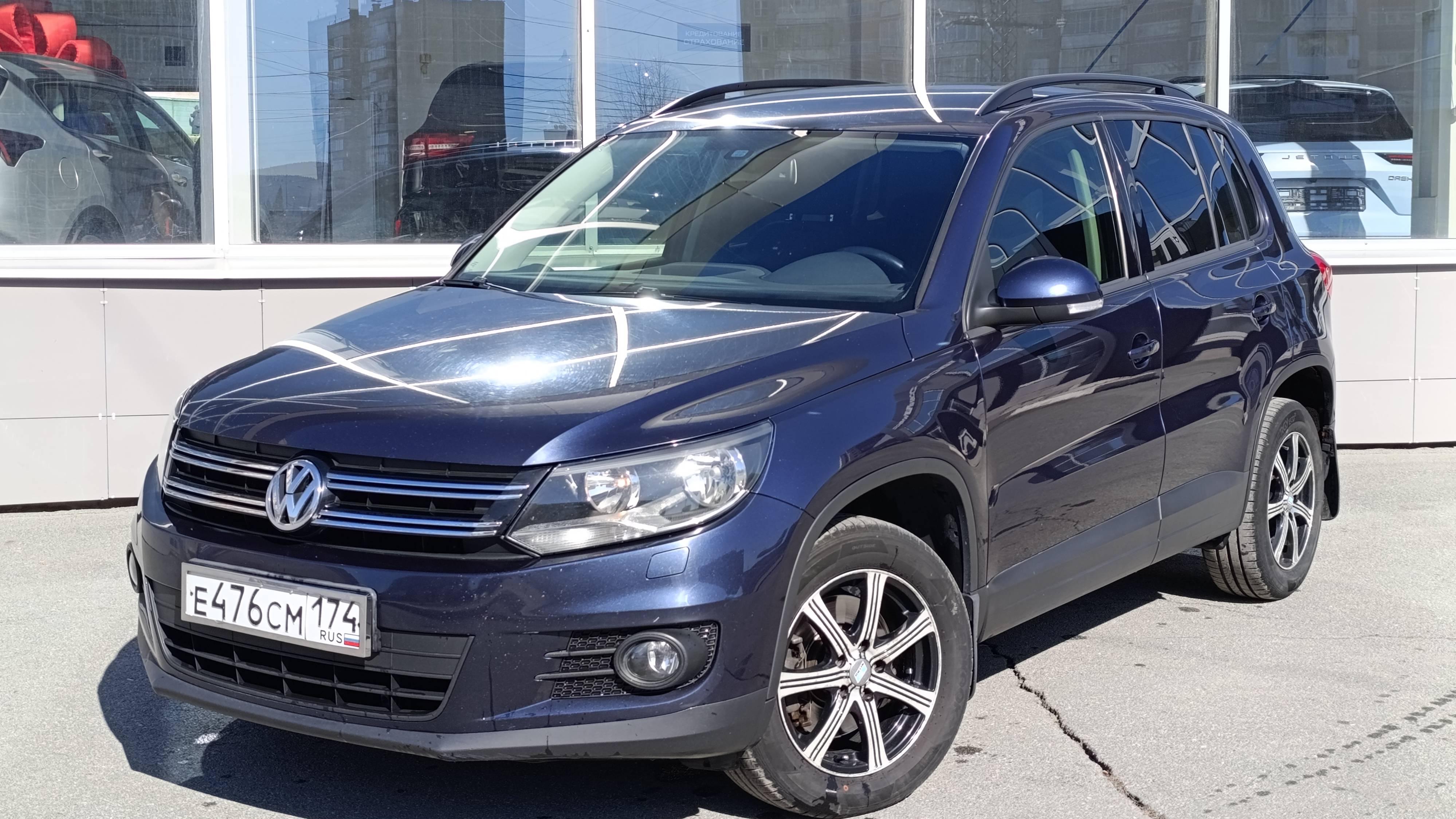 Обзор автомобиля VOLKSWAGEN TIGUAN год 2013 смотреть онлайн