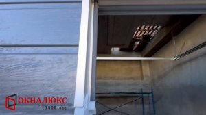 Обзор калики встроенной в секционные ворота. Купить секционные ворота в Севастополе. ОКНАЛЮКС