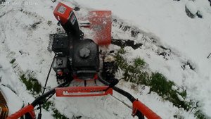 Снегоуборщик в деле.