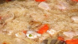 Курица, тушенная с рисом и овощами