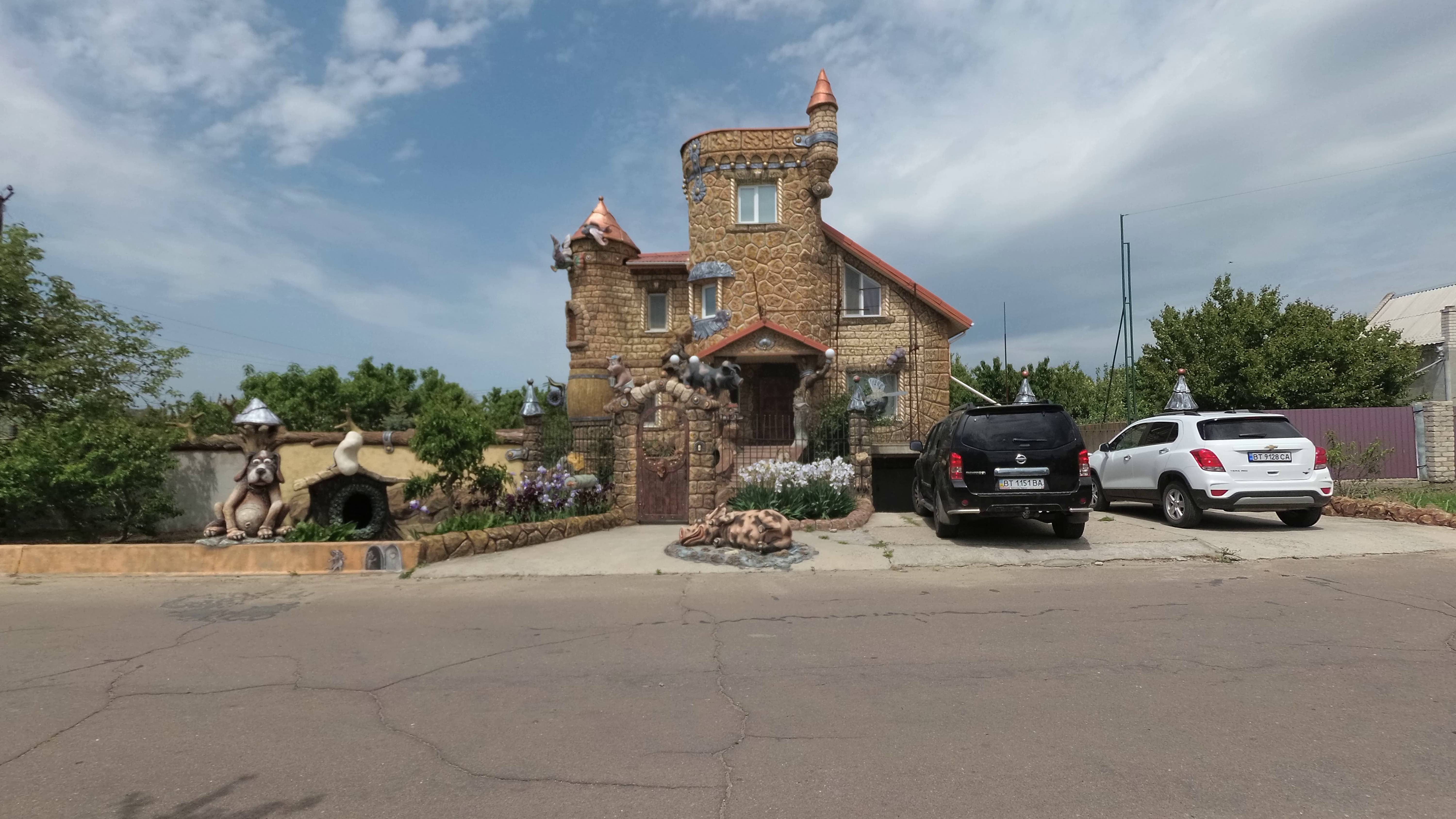 оформление фасада дома Скульптора скульптура медведя из арт бетона