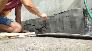 утепление бетонного цоколя и отделка артбетоном