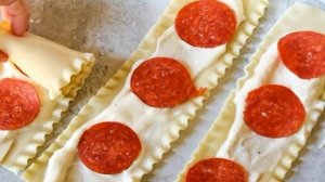 Рулетики с колбасой и сыром в соусе Маринара