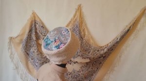 Зимняя, стилизованная под кубанку, шапочка