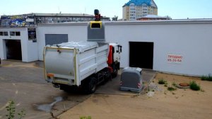 Мусоровоз инновационный. Работа с наземными баками.