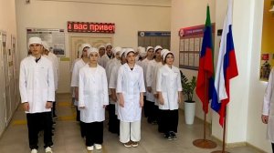 Исполнение гимна и поднятие флага