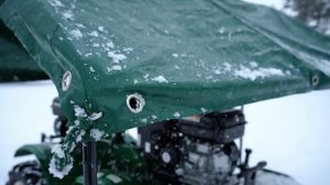 Квадроцикл под тарпаулином