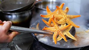 ЖАРЕНЫЙ РИС С МОРСКОЙ ЗВЕЗДОЙ Циндао Морепродукты Китай