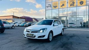 Opel Astra, 2013 год