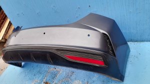 Бампер задний с отверстиями под парктроники (в сборе) Hyundai Solaris II рестайлинг (2020—2025)