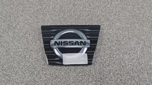 R1450189 Эмблема под дистроник Nissan X-Trail T32 оригинал Б/У 628906FL0A 62310HZ50D