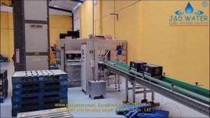 Роторный укладчик-паллетизатор гофрокоробов бутилированной продукции с автоподачей паллет.