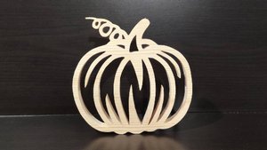 Фигурка тыквы из дерева вырезанная на лобзиковом станке