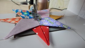 Звездочка из ткани  новогодняя игрушка на ёлку или мини подарок для кухни.