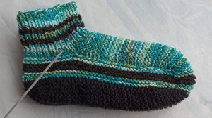 Тапочки- носочки спицами.
