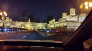 Вечерний город Шарджа из окна такси 02.11.25.