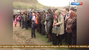 "Улица героя"  (на абазинском языке)"