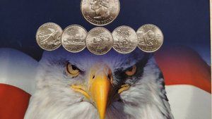 Штаты США на монетах.