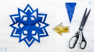 Идея зимнего украшения — вырезание снежинки из бумаги