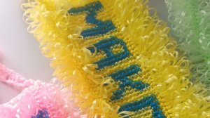 Вывязываем имя в мочалке дальше по схеме крючком