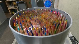 Земной шар из карандашей и эпоксидной смолы.