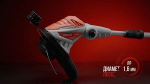 Электрический триммер Ресанта ЭТ 600 в работе