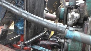 Ремонт радиатора и рулевых тяг трактора.