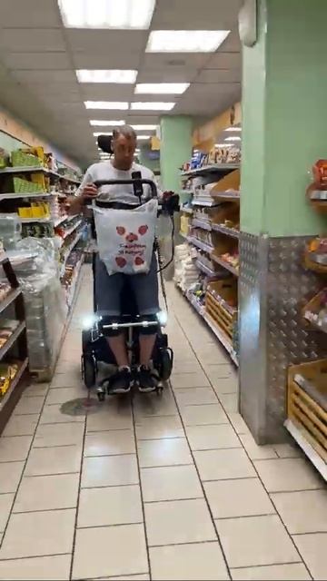 В магазин на электроколяске с вертикализатором смотреть онлайн