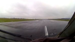 Ан-24 Заход на посадку в Иркутске в условиях облачности и порывистого ветра .