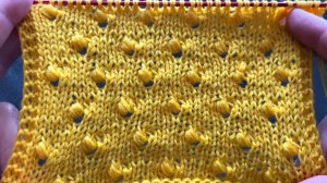 Нежное полотно с шишечками и дырочками