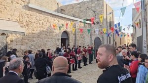 Патриарх с оркестром торжественно шествует в Храм Георгия Победоносца в Лидде