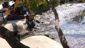 Удаление дамбы ударным молотом.