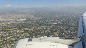 Посадка в Алматы. Заход над городом с видом на горы. Airbus A320neo Air Astana.