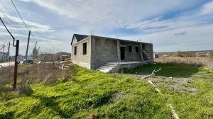 Участок с недостроенным домом в ст. Натухаевской