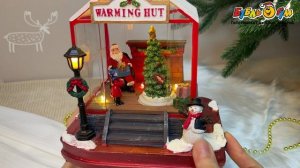 318391 Сувенир новогодний Дом Деда Мороза с подсветкой и звуковыми эффектами 17,5см