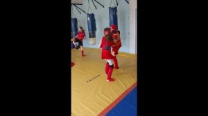 ушу-саньда, раздел "кикбокс" Горбунова Алиса 10 лет и Алексеев Артемий 12 лет тренер Г.В.Ильин