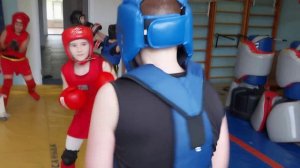 ушу-саньда . раздел "кикбокс". Горбунова Алиса 10 лет и Никита Осипов 11 лет тренер Г.В.Ильин