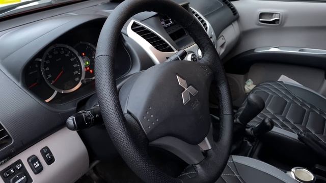 Mitsubishi L200. Перетяжка руля и ручки кпп смотреть онлайн